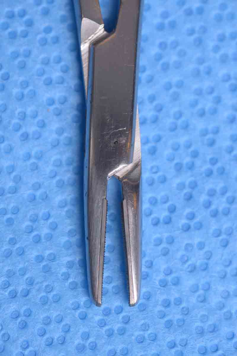 This ring-handle needle holder is used when significant force is needed to pass a needle or when long/deep passes are made through sub-cutaneous tissues.  Often a larger needle, which is at risk for popping off the Castroviejo, is used for these passes.  The brow fixation during posterior hairline browplasty is placed using the Webster Needle Holder.  They are available with smoother or serrated jaws.