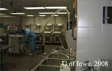 decontamination room shown here contains large wash basins (right side of image) where surgical instruments are cleaned by hand