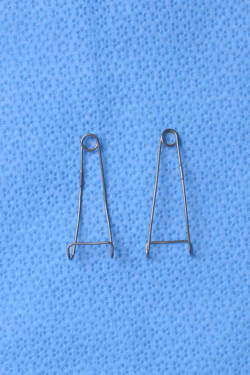 This speculum is designed to pull the lid back with a secure hold to expose the anterior aspect of the globe. The Jaffe lid retractors come in a set of two which allows for simultaneous upper and lower lid retraction.  They can be anchored to surgical drapes using rubber bands and hemostat clamps to effectively keep the eyelids out of the surgical field.  The open wire design exerts less force on the eyelids so there is theoretically less risk of post-operative ptosis or other eyelid malposition.  As the amount of force can be easily adjusted for the upper and lower retractor separately, it can be used to retract delicate tissues such as the skin, orbicularis, and preaponeurotic fat during levator advancement or recession.  These are our preferred lid retractors and are commonly used when performing upper eyelid surgery and enucleations or other oculoplastic surgeries involving the globe. 