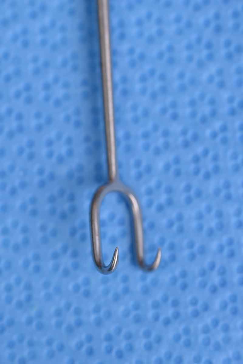 This retractor is larger in size and is often used for elevating thicker tissues while minimizing crush damage.  For example it is used to retract the forehead tissues during a pre-trichial dissection.